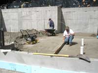 Compacting and leveling sand